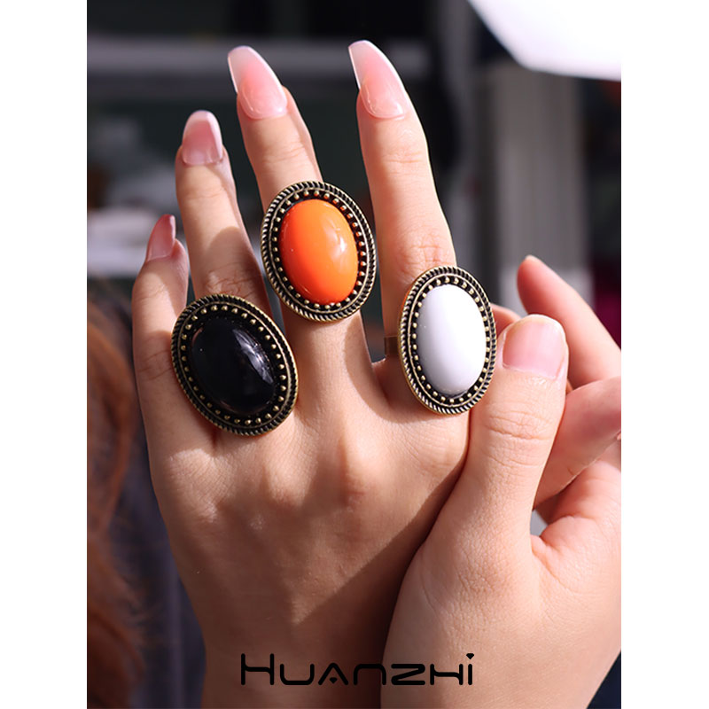 Vintage Fashion Stores - Vintage Orange Color Black White Oval